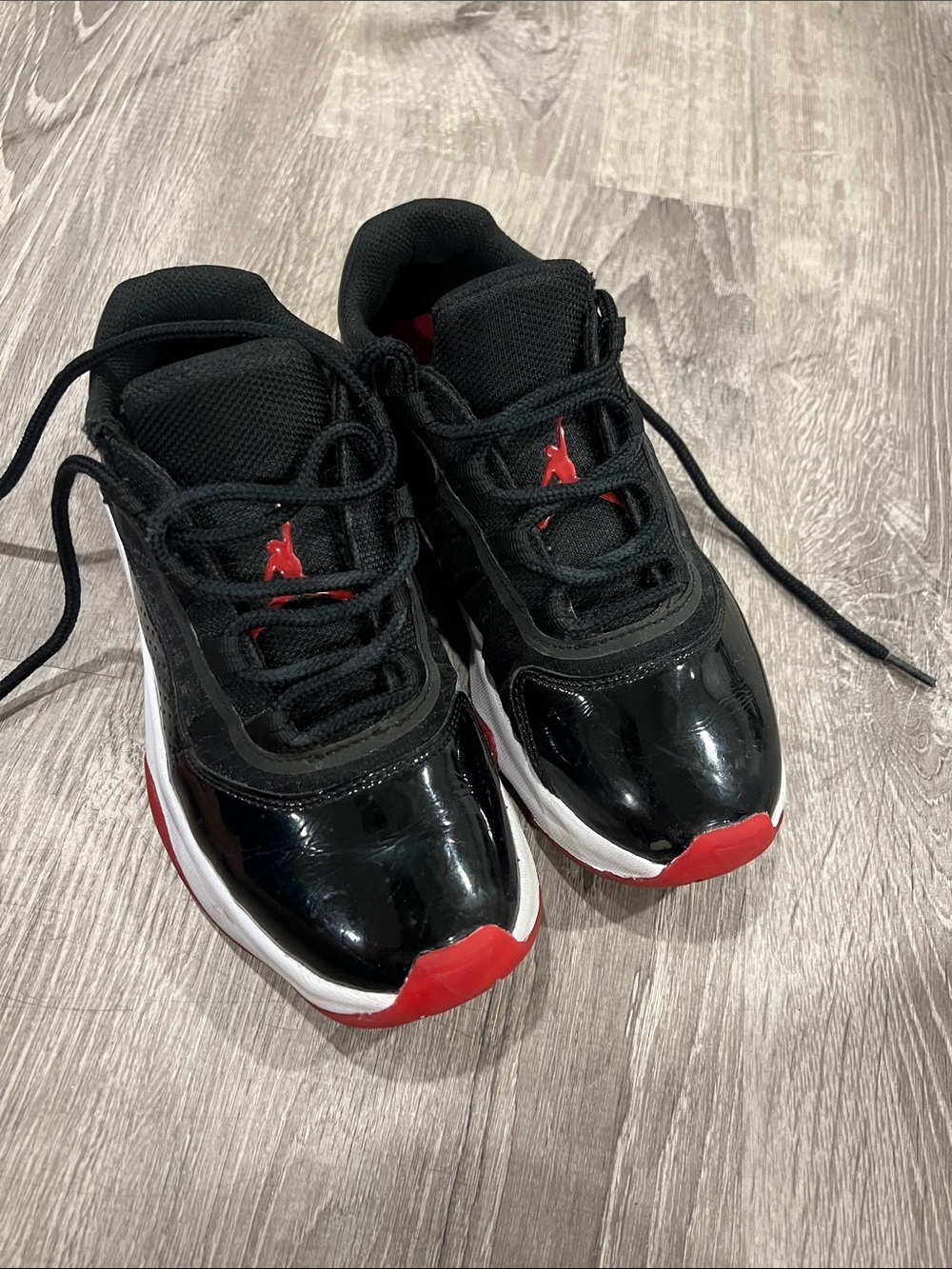 Kids Jordan’s Black and Red Athletic Sneakers size 3.5